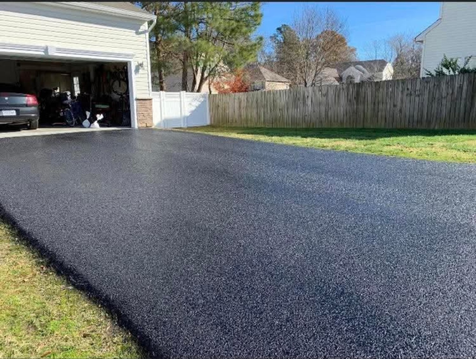Finished residential asphalt driveway